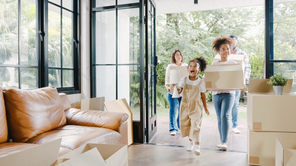A family moving into their new home
