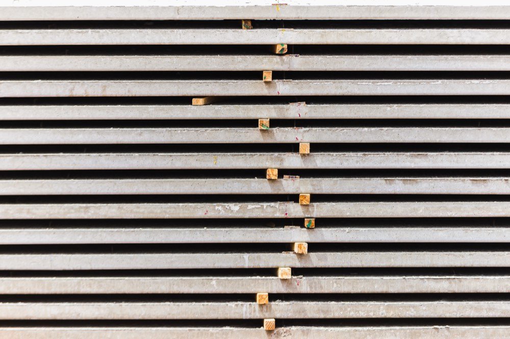 Precast concrete wall panels stacked ready for delivery